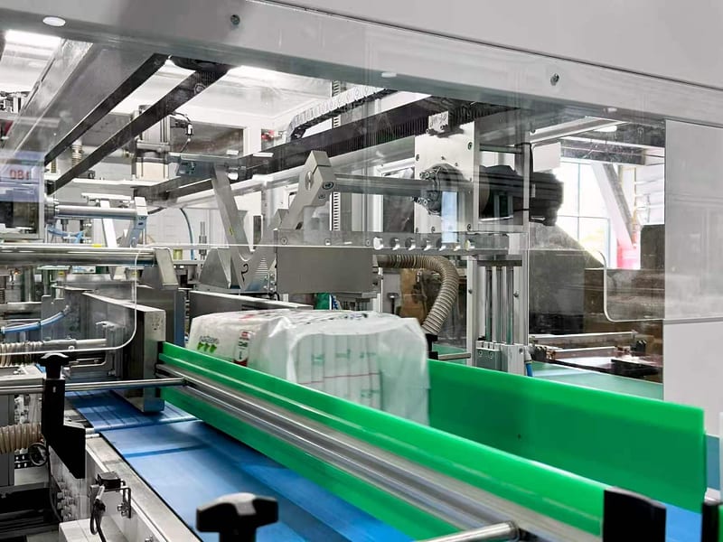 Product travelling along the belt